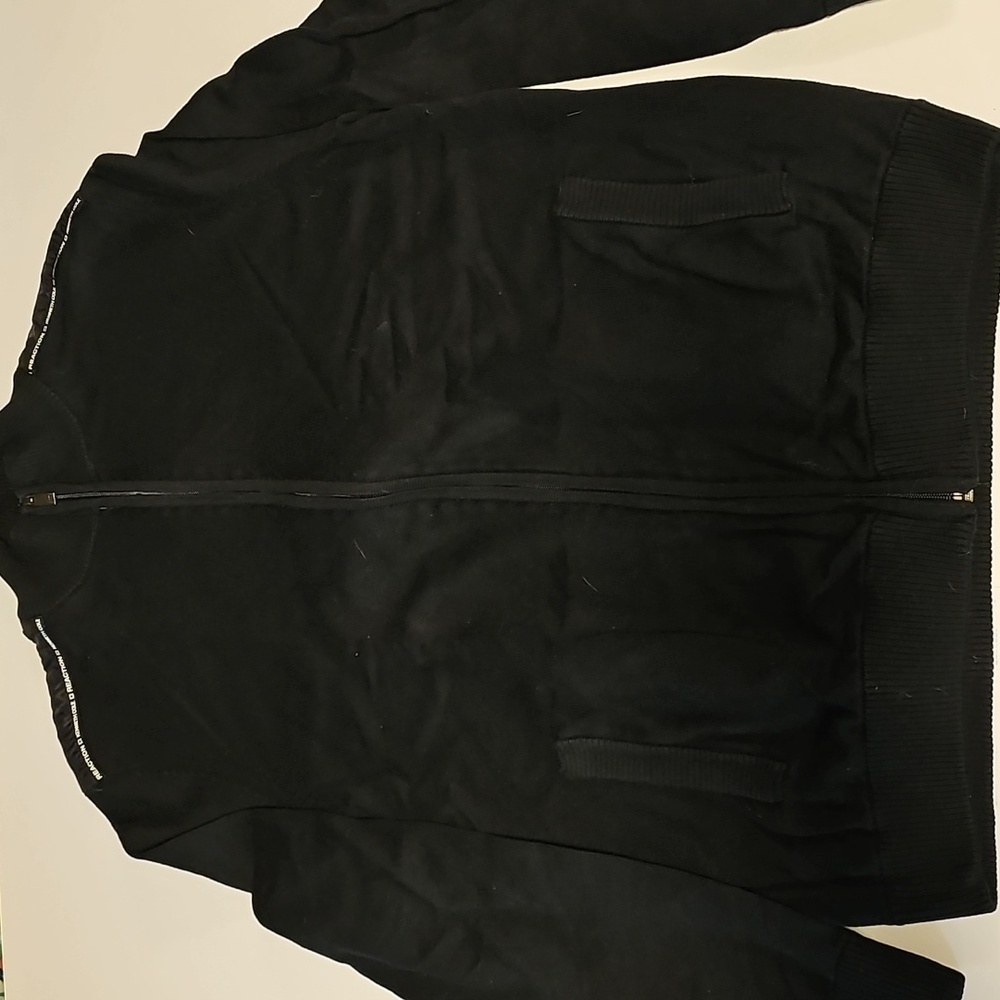 I'm selling a Kenneth Cole reaction full zipper light jacket.